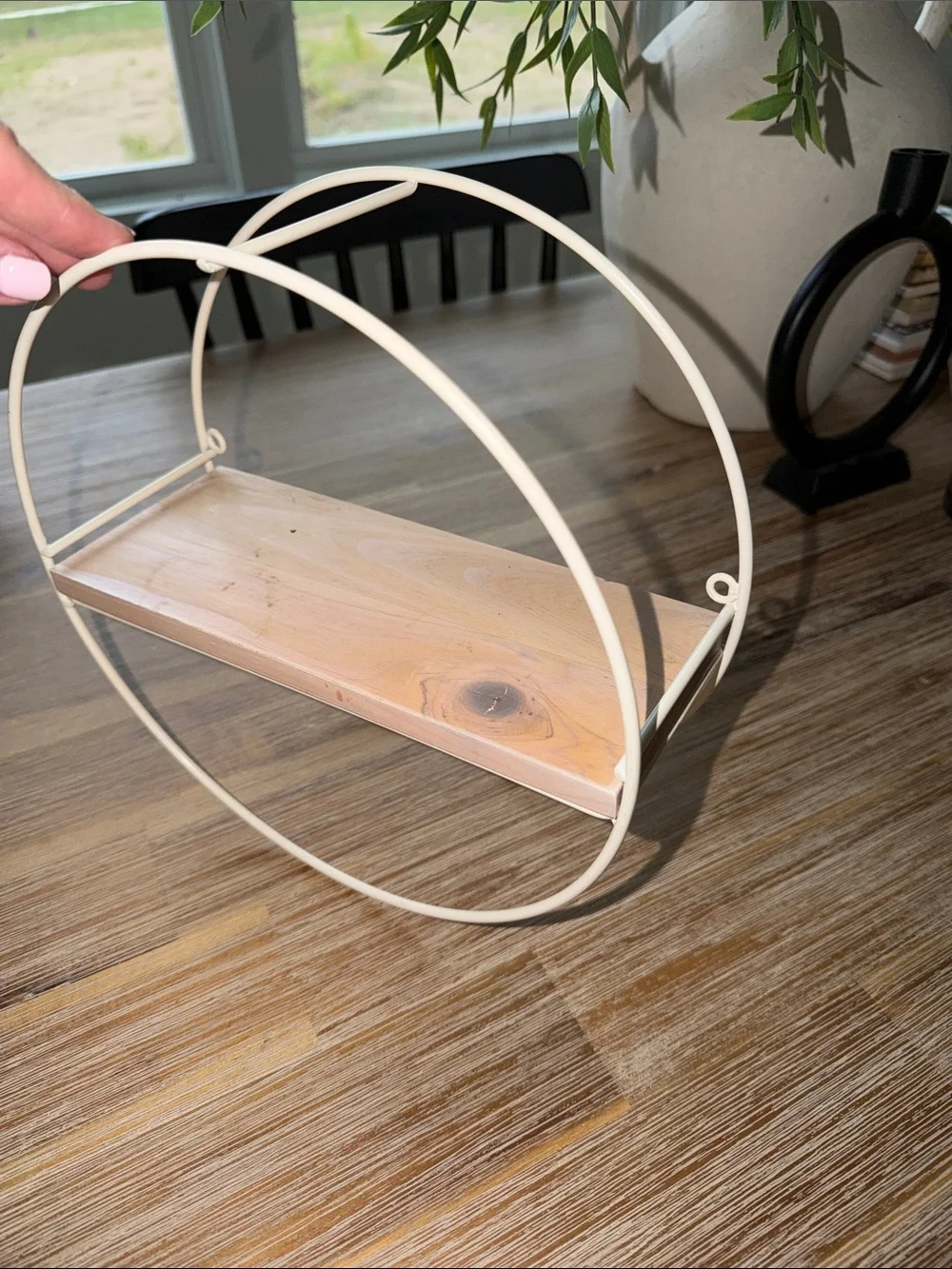 Round White Metal Wall Shelf with Light Wood Accent